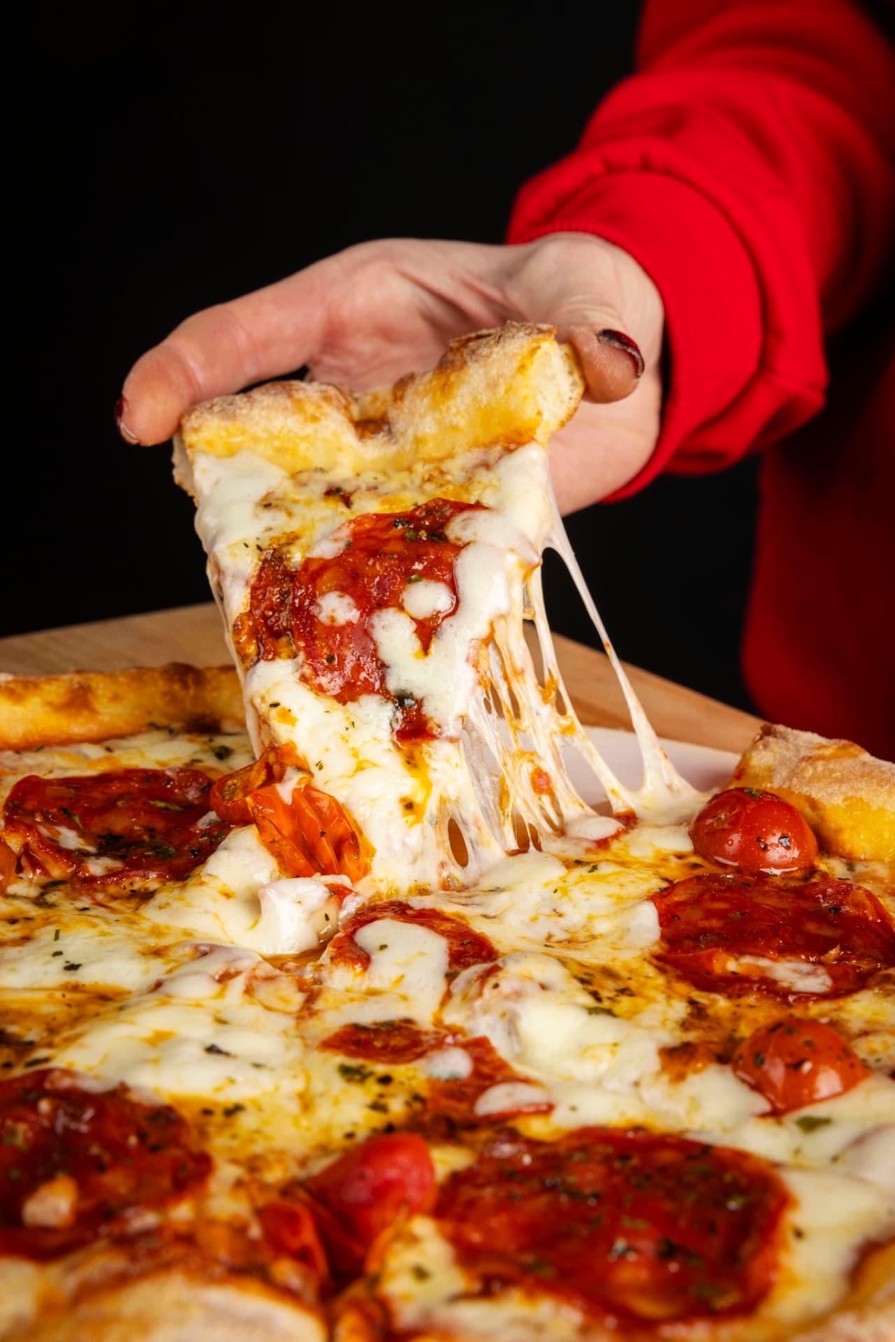 Delicious FIZZA pizza slice with melted cheese